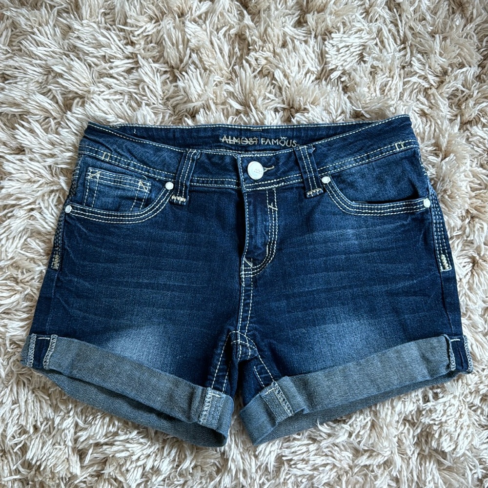 Almost Famous woman’s dark wash jean shorts 7